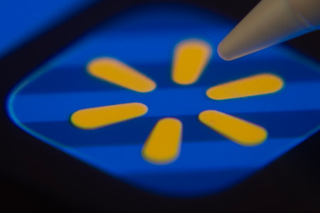 Dhaka, Bangladesh- 06 Dec 2025: Close-up of the Walmart app on a screen with a stylus pointing at it.のeditorial素材