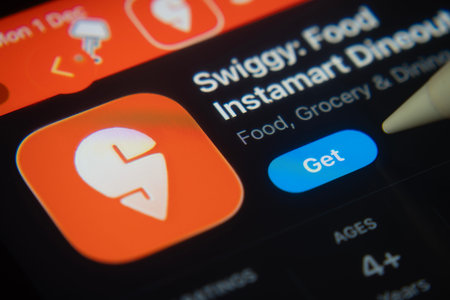 Dhaka, Bangladesh- 01 Dec 2025: A close-up of the Swiggy app icon in the App Store on an iPad screen.
