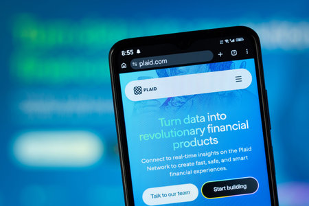 Dhaka, Bangladesh - 05 May 2026: Close-up of Plaid's homepage on a smartphone.