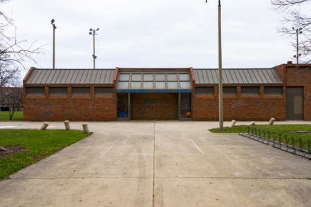Chicago, IL, United States - March 23, 2017: A shot of Jefferson Park Pool Building. Cleaned graffiti is still visible on the buildings outer walls.のeditorial素材