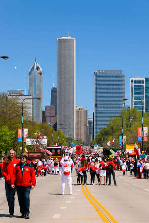 Chicago, IL, United States - May 06, 2017: People parading in Chicago during the Polish Consitution Day Parade.のeditorial素材