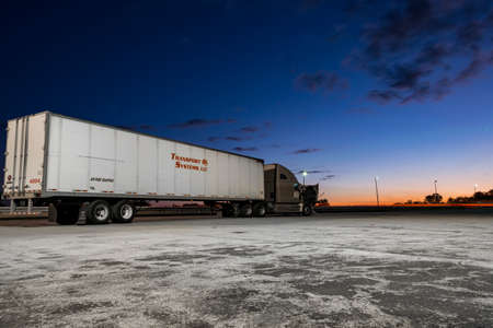 Vickery, OH, United States - September 8, 2017: Long exposure shot of a broken down truck on a ramp to Interstate 80 west-bound from one of Ohio's service plazas taken during sunset.のeditorial素材