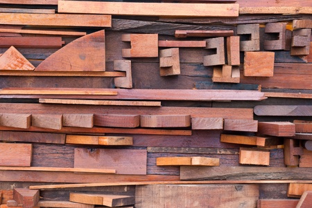 Wall made of different sizes of cut wood.の写真素材