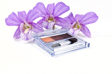 women cosmetics with orchids.