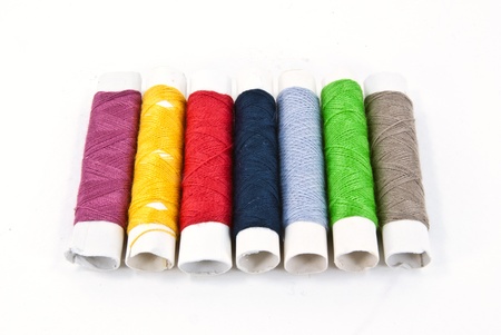 A colorful spools of thread.