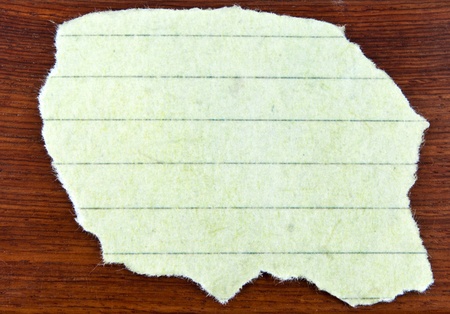 A vintage paper on a wood texture.の写真素材