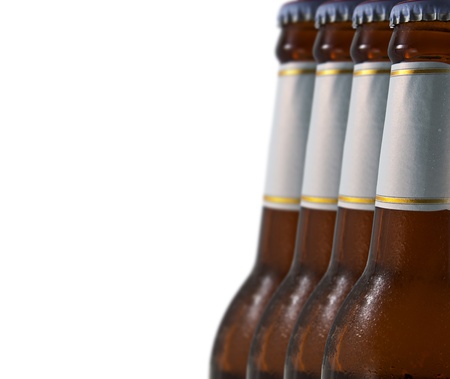 Full bottle of lager beer on the white background.の写真素材