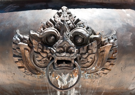 Lion head on a chinese copper censer surface.の写真素材