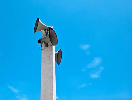 Loudspeaker against the blue sky.の写真素材