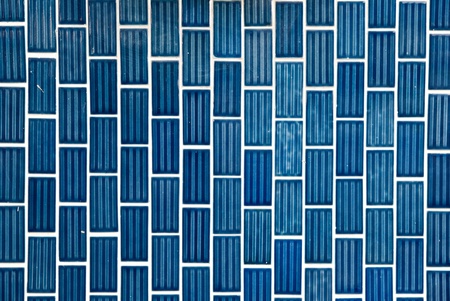 Tile texture background of bathroom or swimming pool tiles on wall.の写真素材