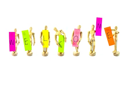 Wooden action figure and colorful words seriesの写真素材