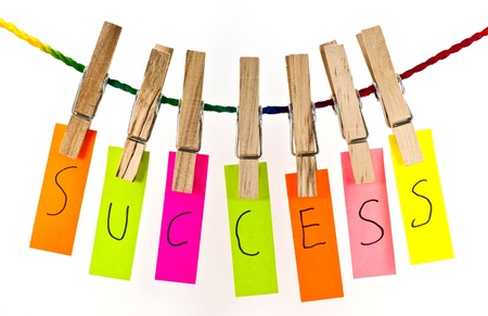 Wooden clothespin and colorful words series on rope の写真素材