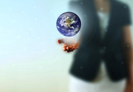 Earth globe in the Business woman hand. Photo earth from NASA satellite. の写真素材