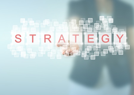Business woman hand and STRATEGY words の写真素材