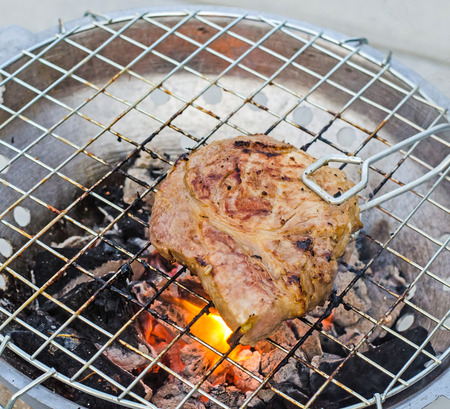 Grilling porkの写真素材