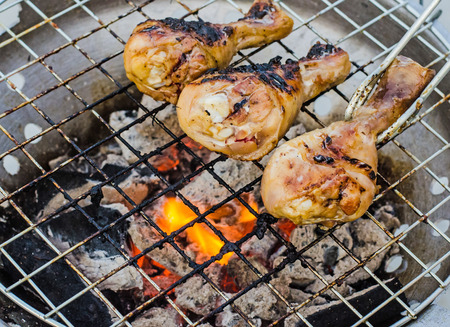 Grilling chicken の写真素材