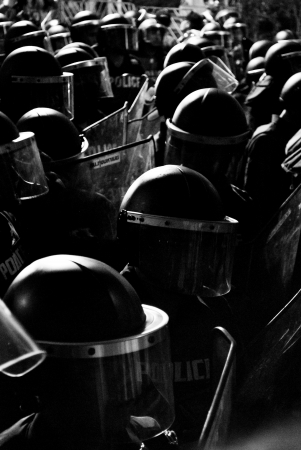 Group of riot police in full gearの写真素材