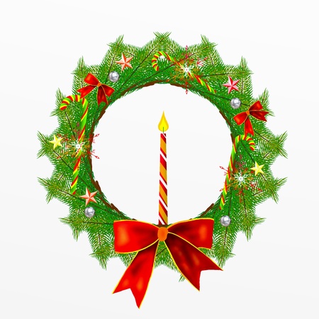 Christmas Wreath with Christmas Decoration and Candleの写真素材