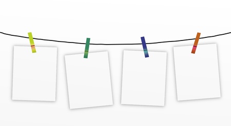 Hand Drawing of Four Blank Notes Hanging on Four Colour of Clothespins, Isolated on A White Background  の写真素材