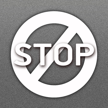 The No Sign or Forbidden Sign and Word  STOP  Painted On A Road Surface Freshly Covered with Asphalt...
