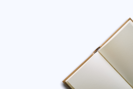 Blank diary notebook on the white background with copy spaceの写真素材