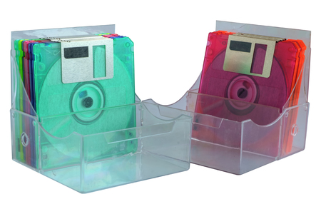 Floppy disk in box container on white background, old technology and legacy industrial computer equipmentの写真素材