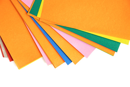 Colourful paper on white background with copy space for office and school stationary concept