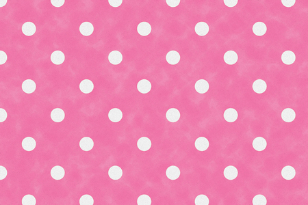 White circle polka dot pattern on pink pale paper background for wrapping paper designの写真素材