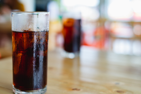 Soft drink on wooden table for drinks and beverage conceptの写真素材