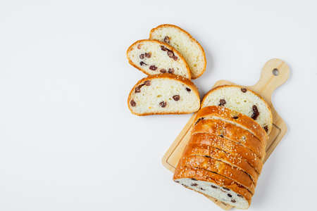 Sliced fine whole wheat bread on white background for bakery, food and eating conceptの写真素材