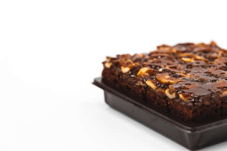 Delicious toffee cake on white background for bakery, food and eating concept