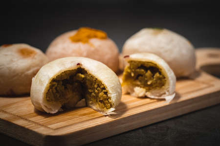 Traditional Chinese pastry against dark background for food and bakery conceptの写真素材