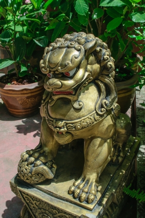 Statue of traditional temple lion in the northern Thailandの写真素材