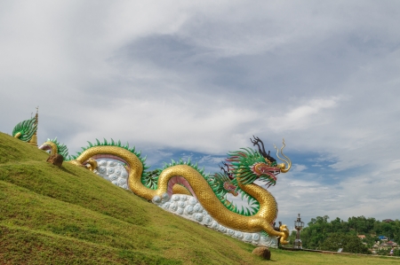 Large Chinese Golden dragon at temple, Thailandの写真素材