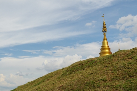 Golden stupa on the top of mountain, Thailandの写真素材