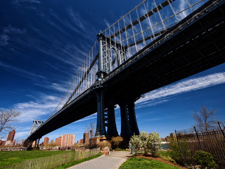 Manhattan Bridge with blue skyの写真素材