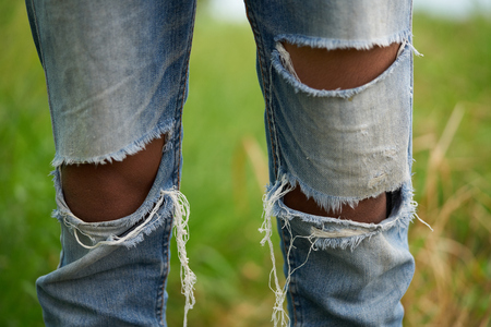 young people wearing a blue distressed jeans styles. worker in the farm.の写真素材