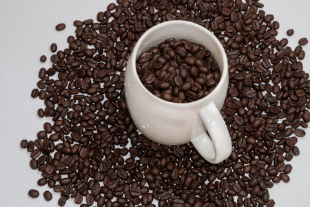 Cup and coffee beans.の写真素材