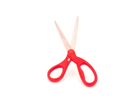 Scissors with red handle on white backgound の写真素材
