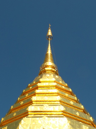 Golden pagoda with blue sky at Doi Suthep の写真素材