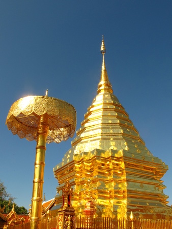 Golden pagoda with blue sky at Doi Suthep の写真素材