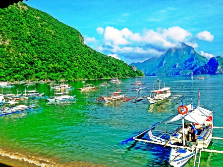 view of boats on sea with beautiful mountainの素材
