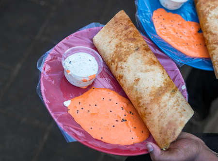 Indian street food Dosa with chutneyの写真素材