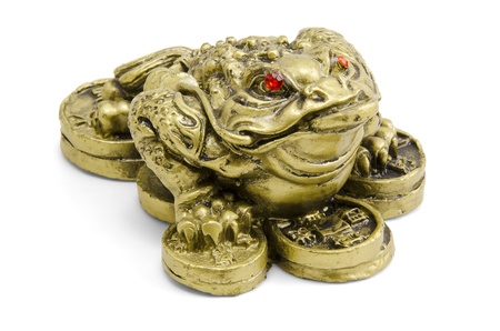 Feng Shui frog sitting on moneyの写真素材