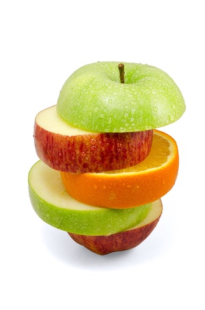 Apple and orange slices isolated on white backgroundの写真素材