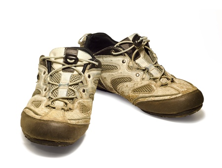 Old sport shoes isolated on whiteの写真素材