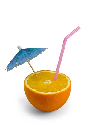 Close-up of orange with a straw and umbrella, isolated on whiteの写真素材