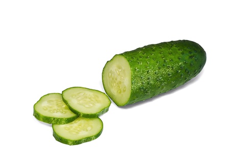 Cucumber and slices isolated over white backgroundの写真素材