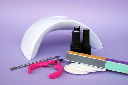 Set for manicure. Lamp for nails. Master of nail service.の写真素材