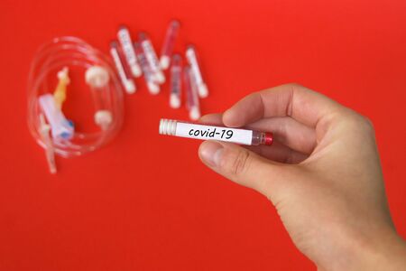 Covid-2019 virus concept. Syringe and ampoules with a vaccine against the virus.の写真素材